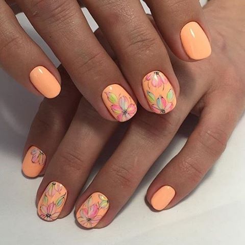 Помаранчевий манікюр з ручним квітковим розписом