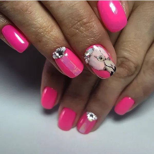Рожево-білий блискучий манікюр: овальні нігті у стилі максималізм