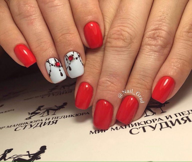Червоний манікюр: 3D-дизайн зі стразами та ручним розписом