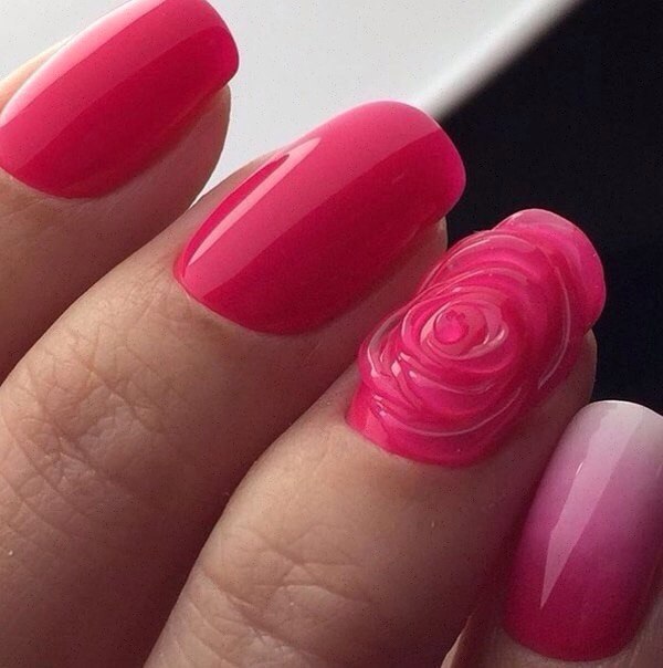 Максималістичний рожевий омбре на овальних нігтях з 3D квітами ручного розпису