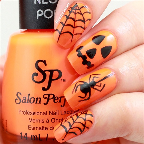 Помаранчево-чорний манікюр: ручний розпис для Хеллоуїну