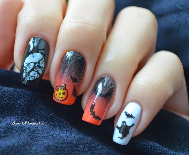 Чорно-помаранчевий манікюр омбре з ручним розписом для Хелловіну