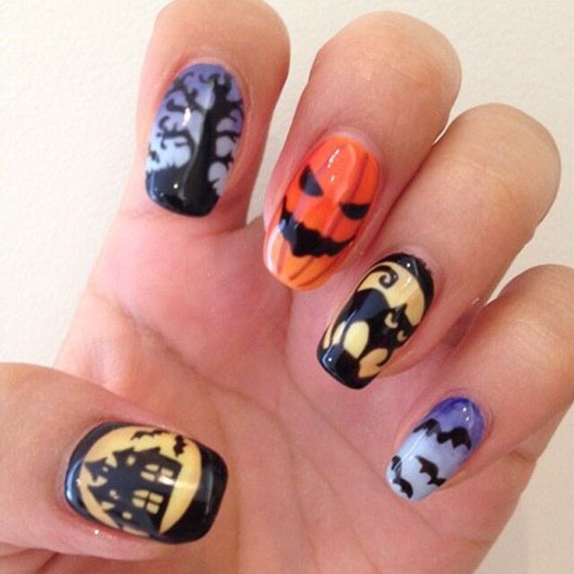 Помаранчево-Чорний Максималізм: Хеллоуїнський Ручний Розпис на Овальних Нігтях