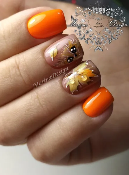 Овальний манікюр: 3D квітковий максималізм в помаранчевих та бежевих тонах