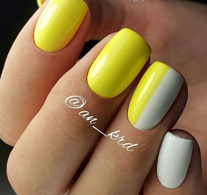 Мінімалістичний жовтий манікюр: біла геометрія на овальних нігтях