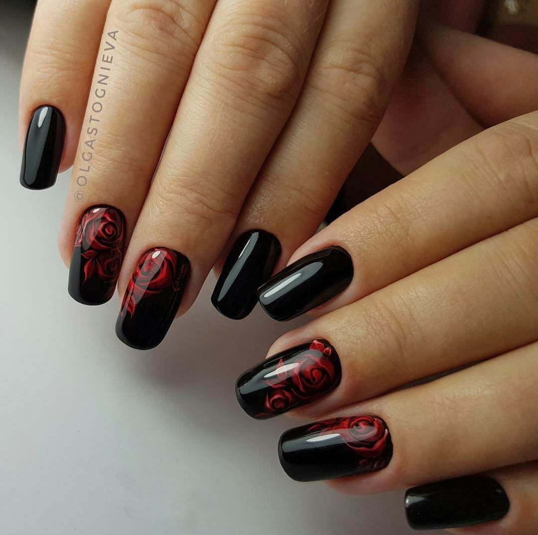 Квітковий максималізм: чорний манікюр з червоним ручним розписом