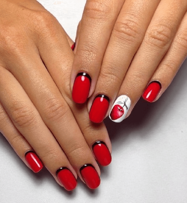 Червоний френч з чорним акцентом на овальних нігтях