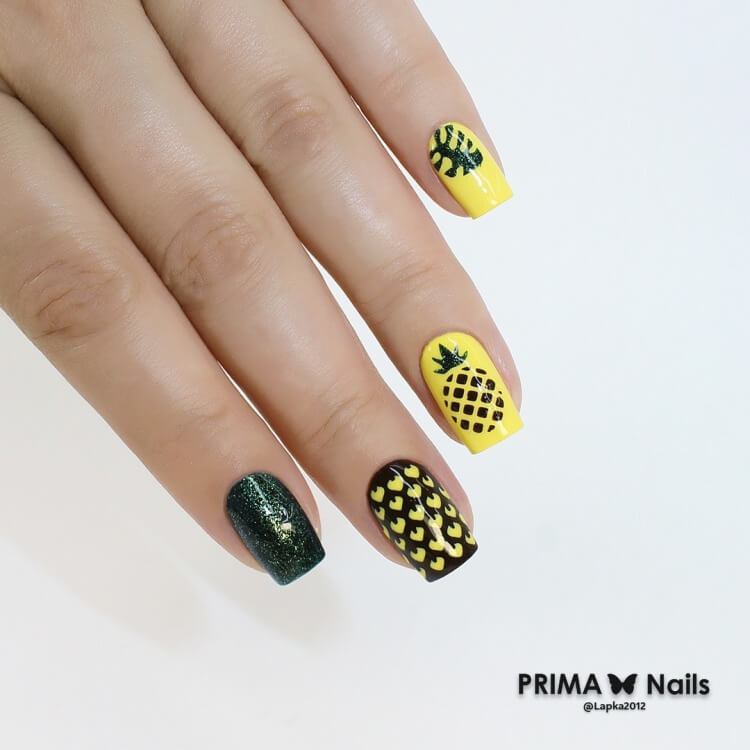 Жовтий манікюр з чорними геометричними лініями та блиском