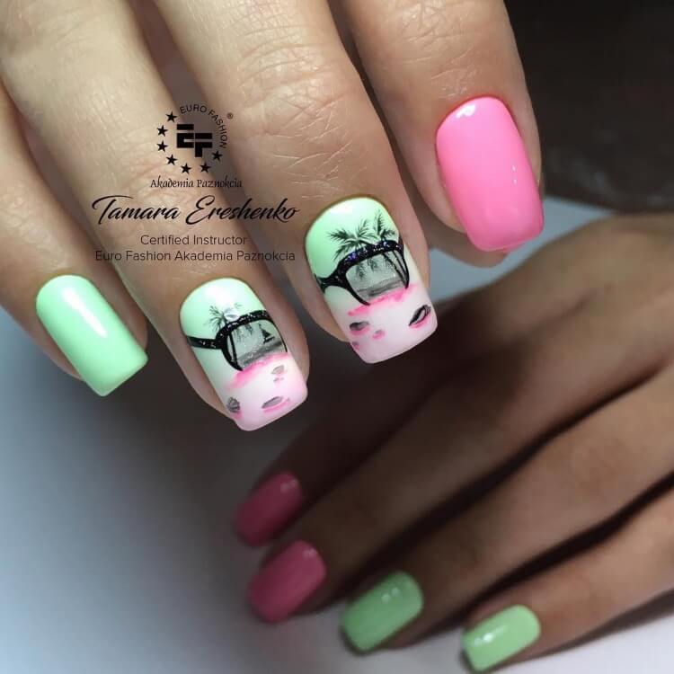 Абстрактний манікюр: рожевий з зеленими та чорно-білими акцентами
