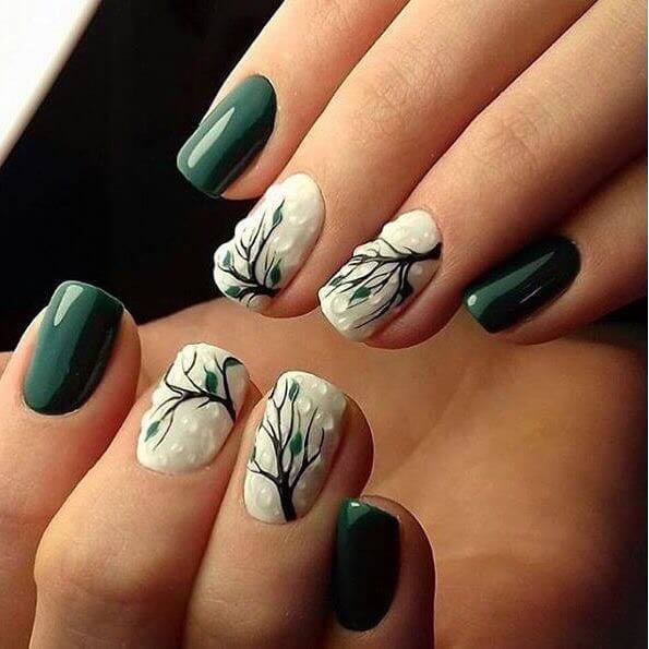 Білий манікюр з об'ємними зеленими квітами та ручним розписом