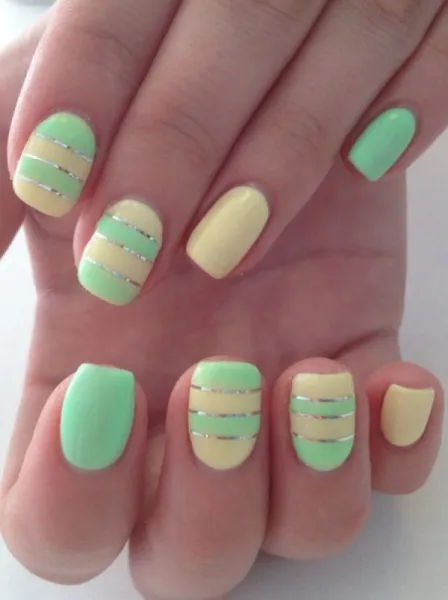 Зелено-жовтий мінімалізм на овальних нігтях: геометричні акценти