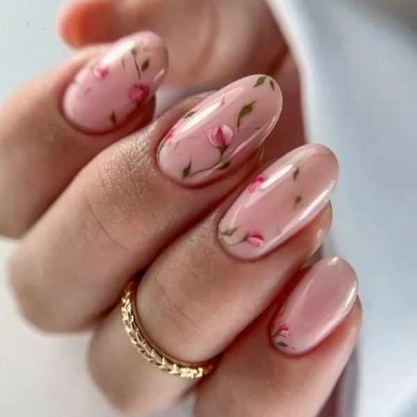 Рожево-зелений мінімалістичний квітковий манікюр на овальні нігті